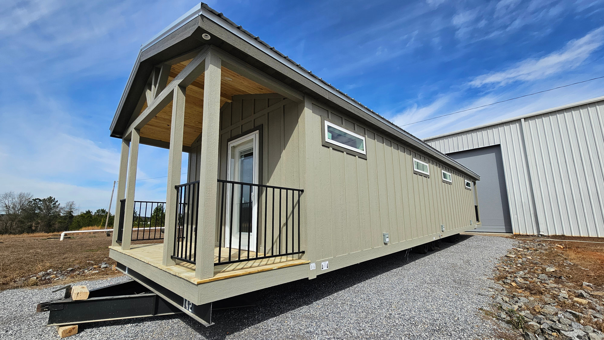 Custom bath house with covered porch