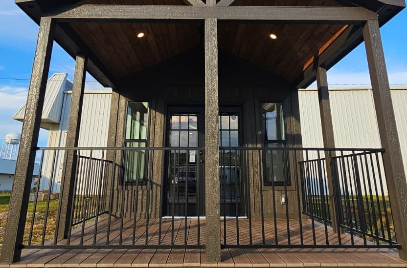 Black metal porch railing option on a Phoenix park model home